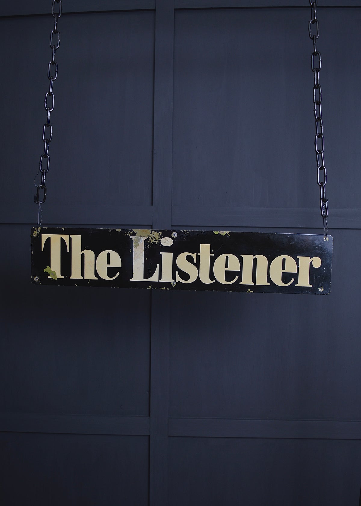 ‘The listener’ metal sign