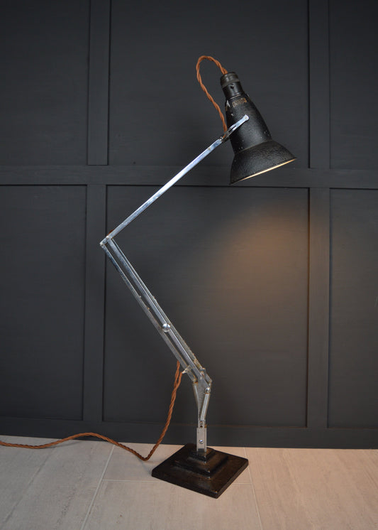 1930s Black 3 step anglepoise 1227 lamp switched on