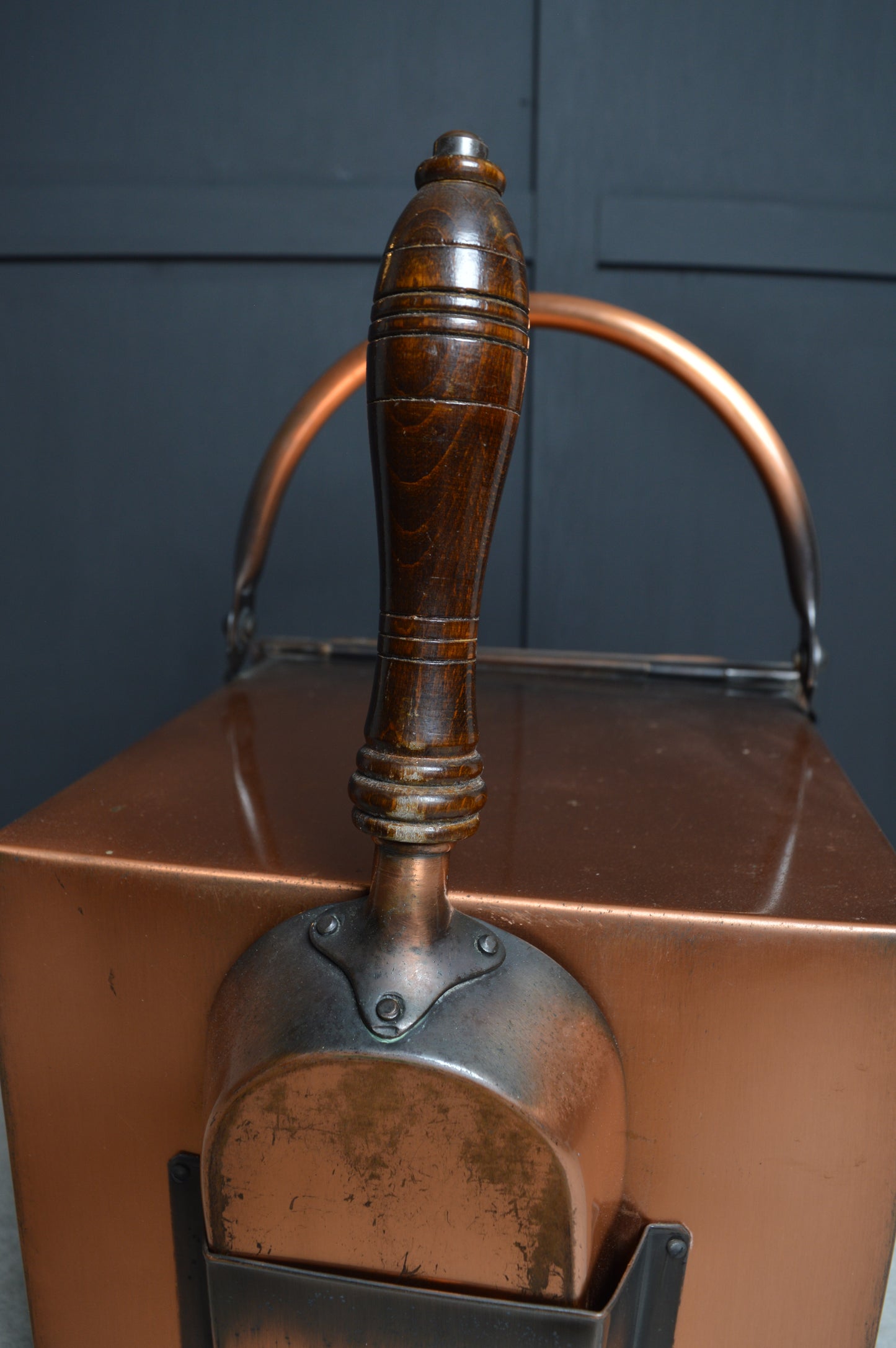 Antique copper coal scuttle with wooden handle and matching shovel, vintage home decor