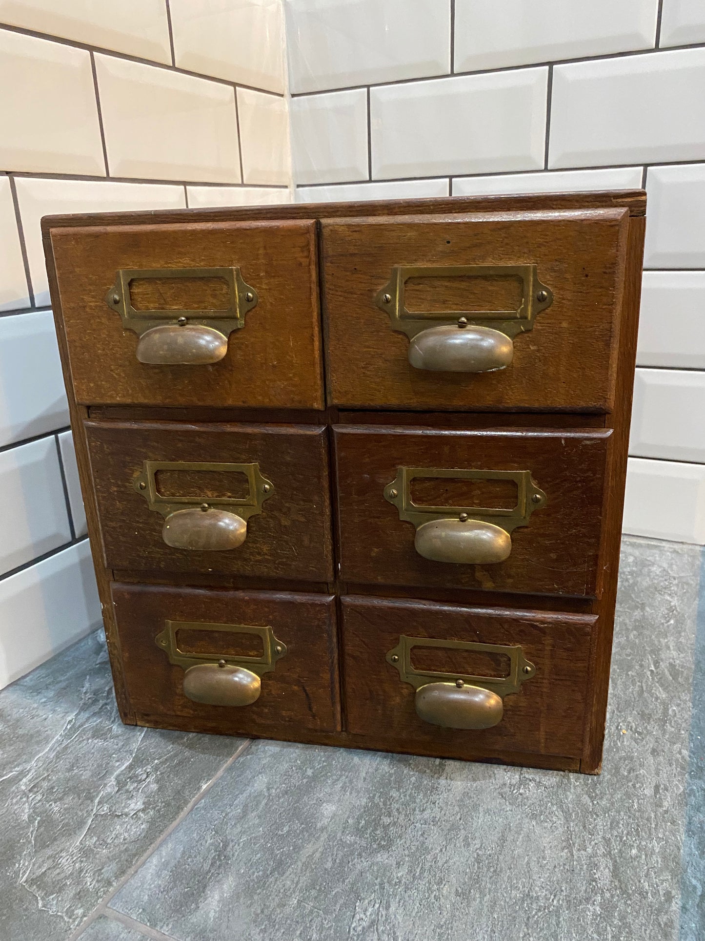 Early 20th century rustic oak 6 drawer index cabinet.