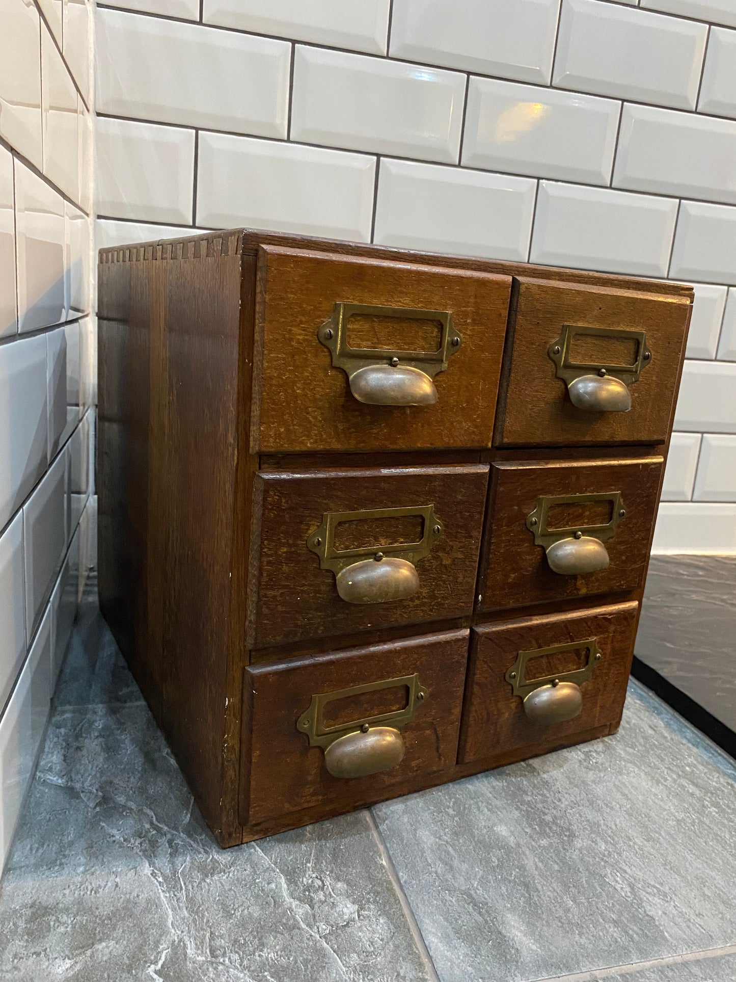 Early 20th century rustic oak 6 drawer index cabinet.