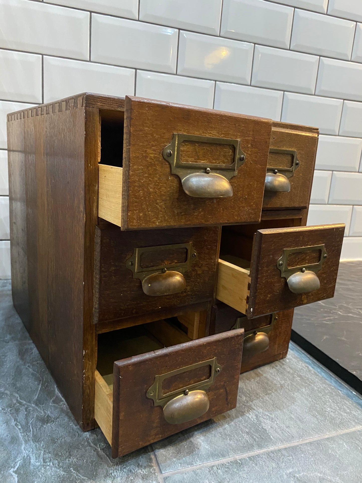 Early 20th century rustic oak 6 drawer index cabinet.