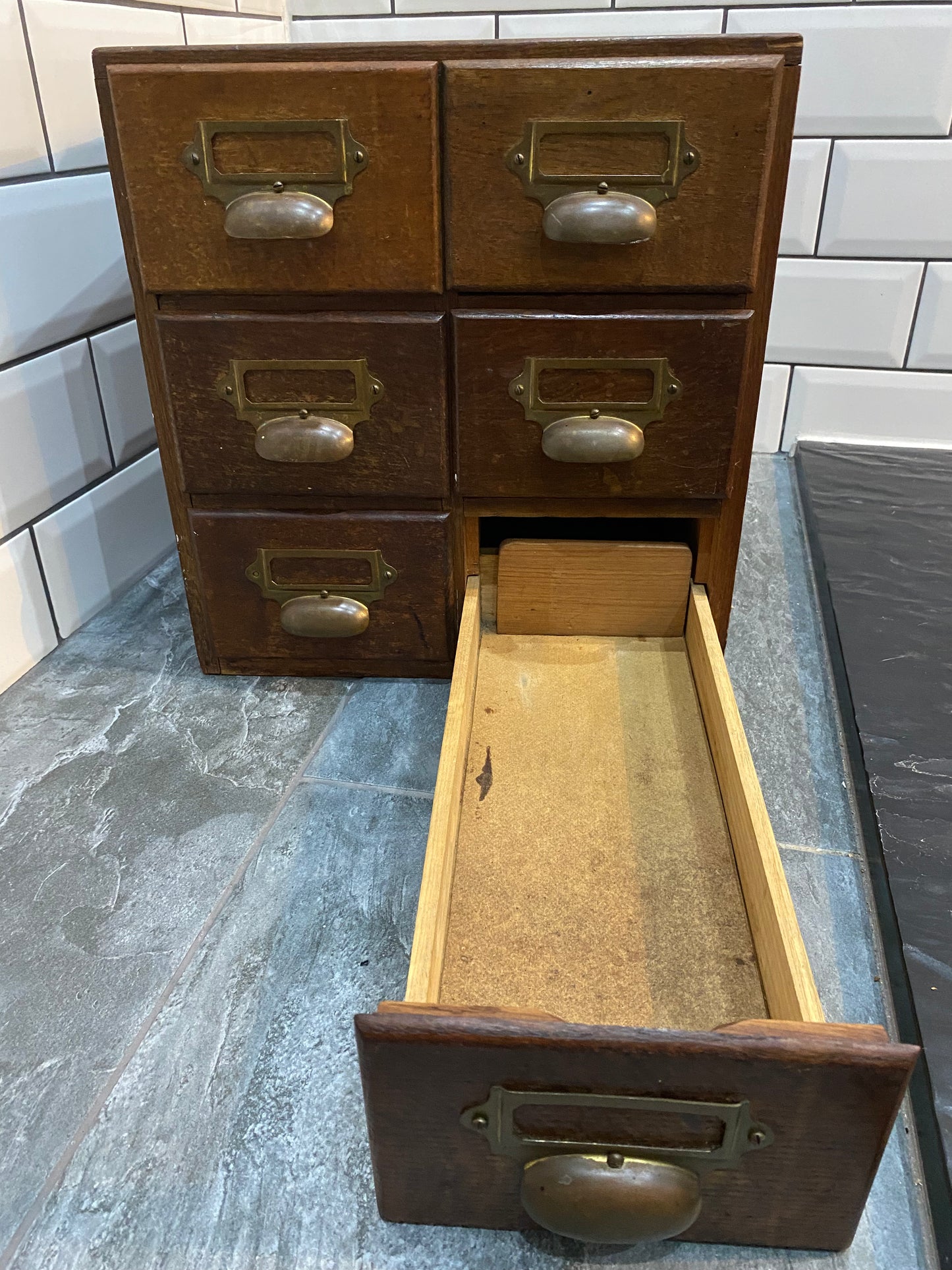 Early 20th century rustic oak 6 drawer index cabinet.
