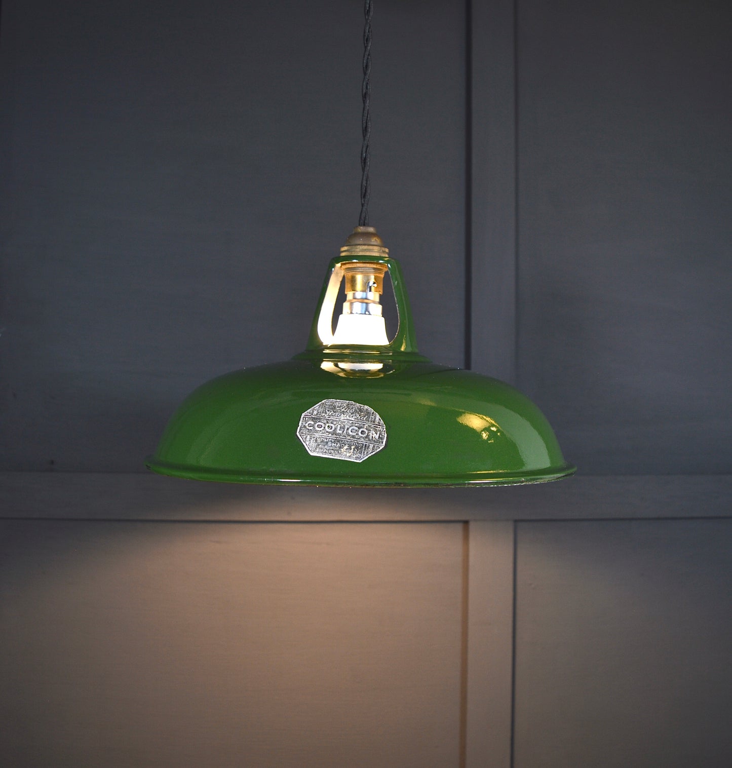 Vintage industrial enamel pendant lights by Coolicon (circa, 1940s)