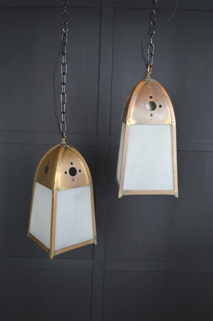 Pair of gothic revival glazed brass lights