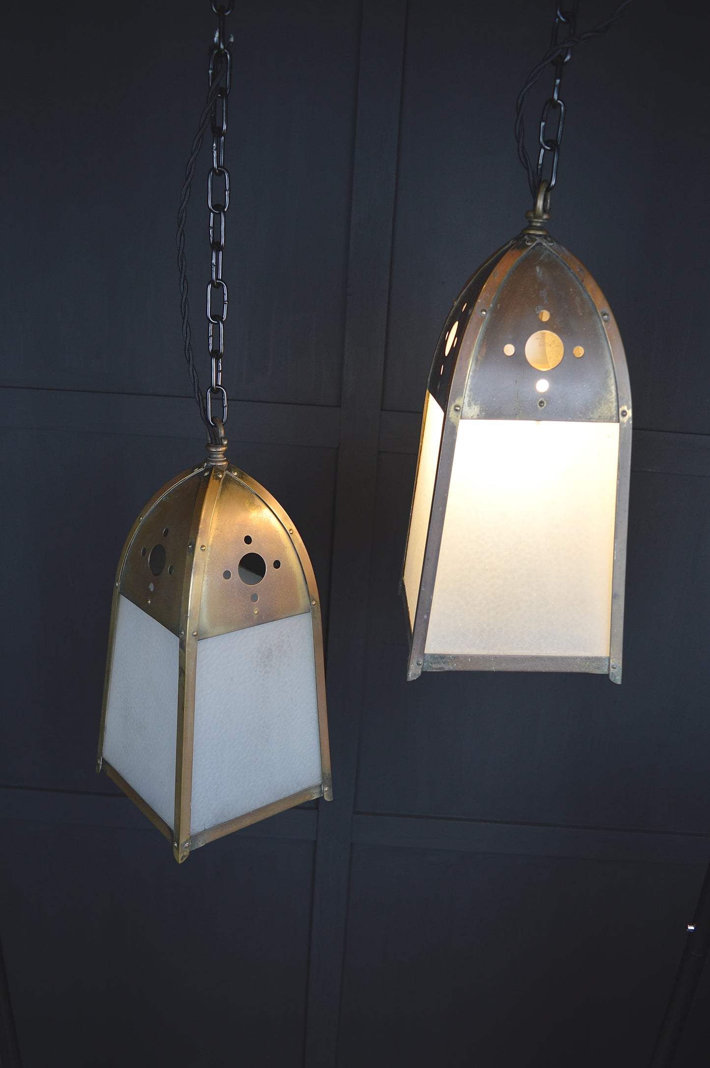 Pair of gothic revival glazed brass lights