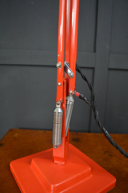 Red Anglepoise model 1227 lamp by Herbert Terry