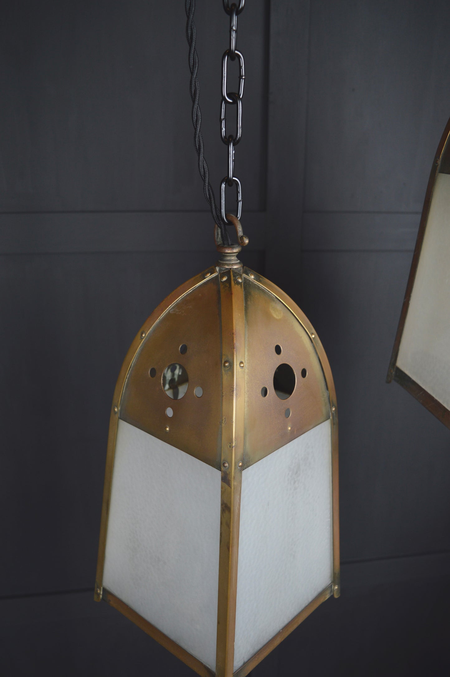 Pair of gothic revival glazed brass lights