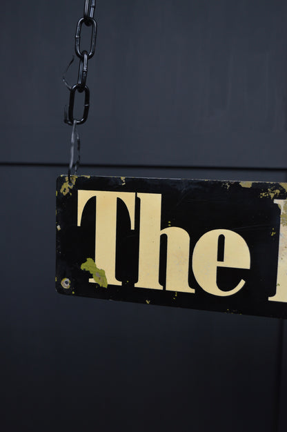 ‘The listener’ metal sign