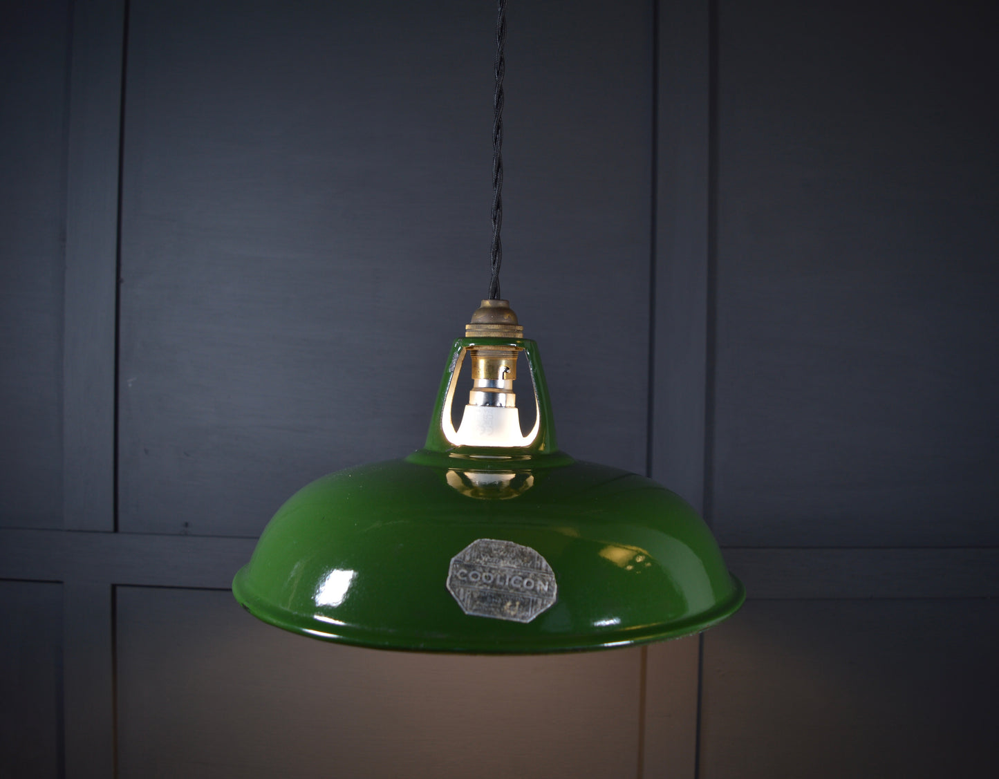Vintage industrial enamel pendant lights by Coolicon (circa, 1940s)