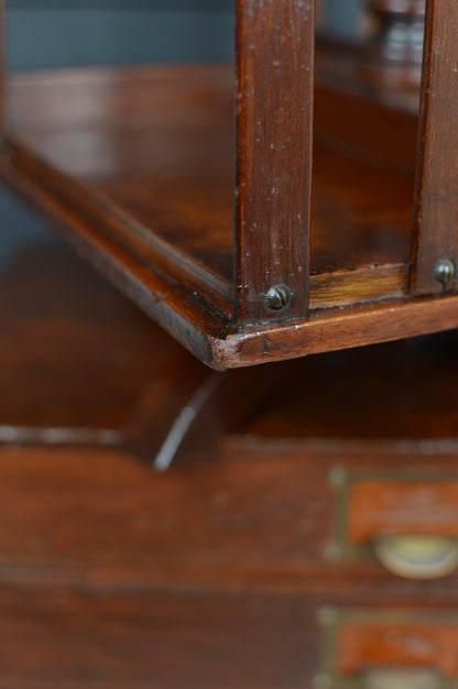 Revolving mahogany book case