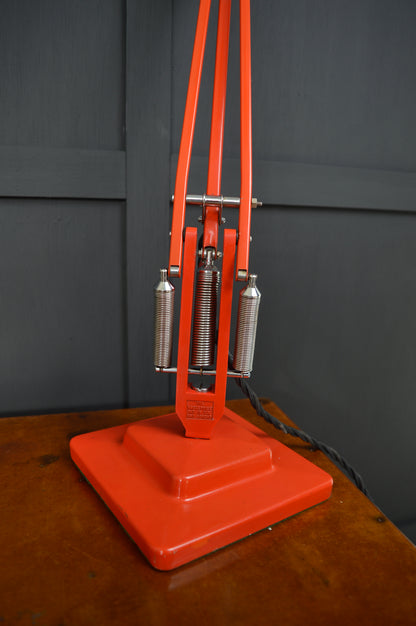Red Anglepoise model 1227 lamp by Herbert Terry