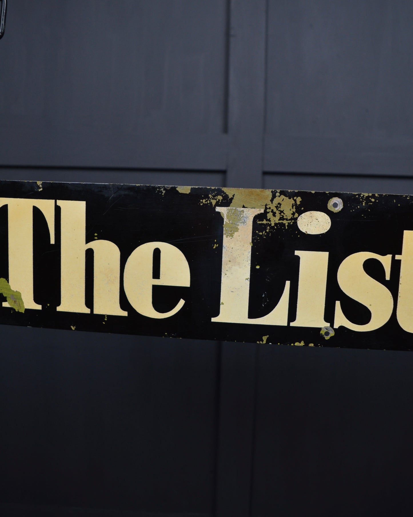 ‘The listener’ metal sign
