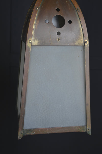 Pair of gothic revival glazed brass lights