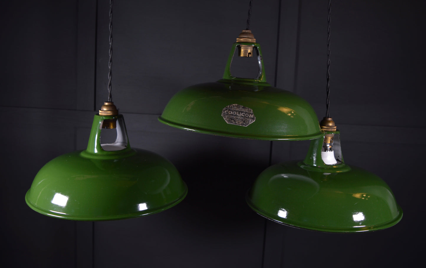Vintage industrial enamel pendant lights by Coolicon (circa, 1940s)