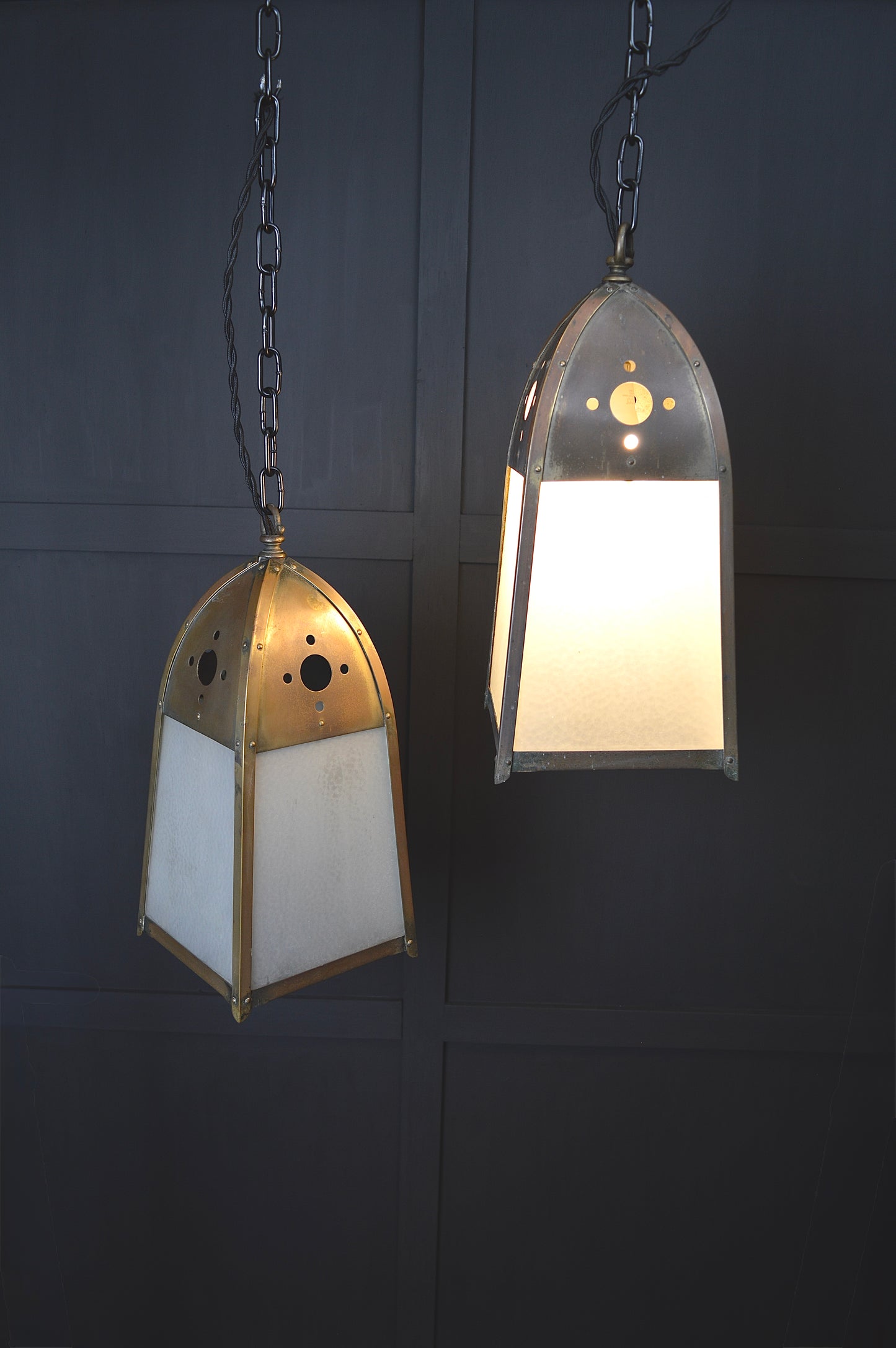 Pair of gothic revival glazed brass lights