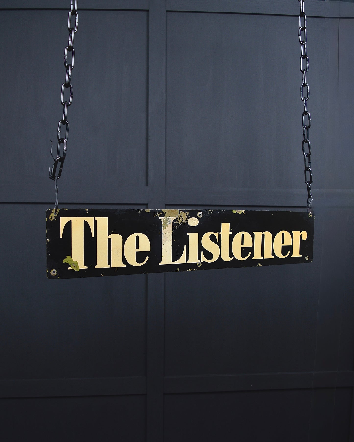 ‘The listener’ metal sign