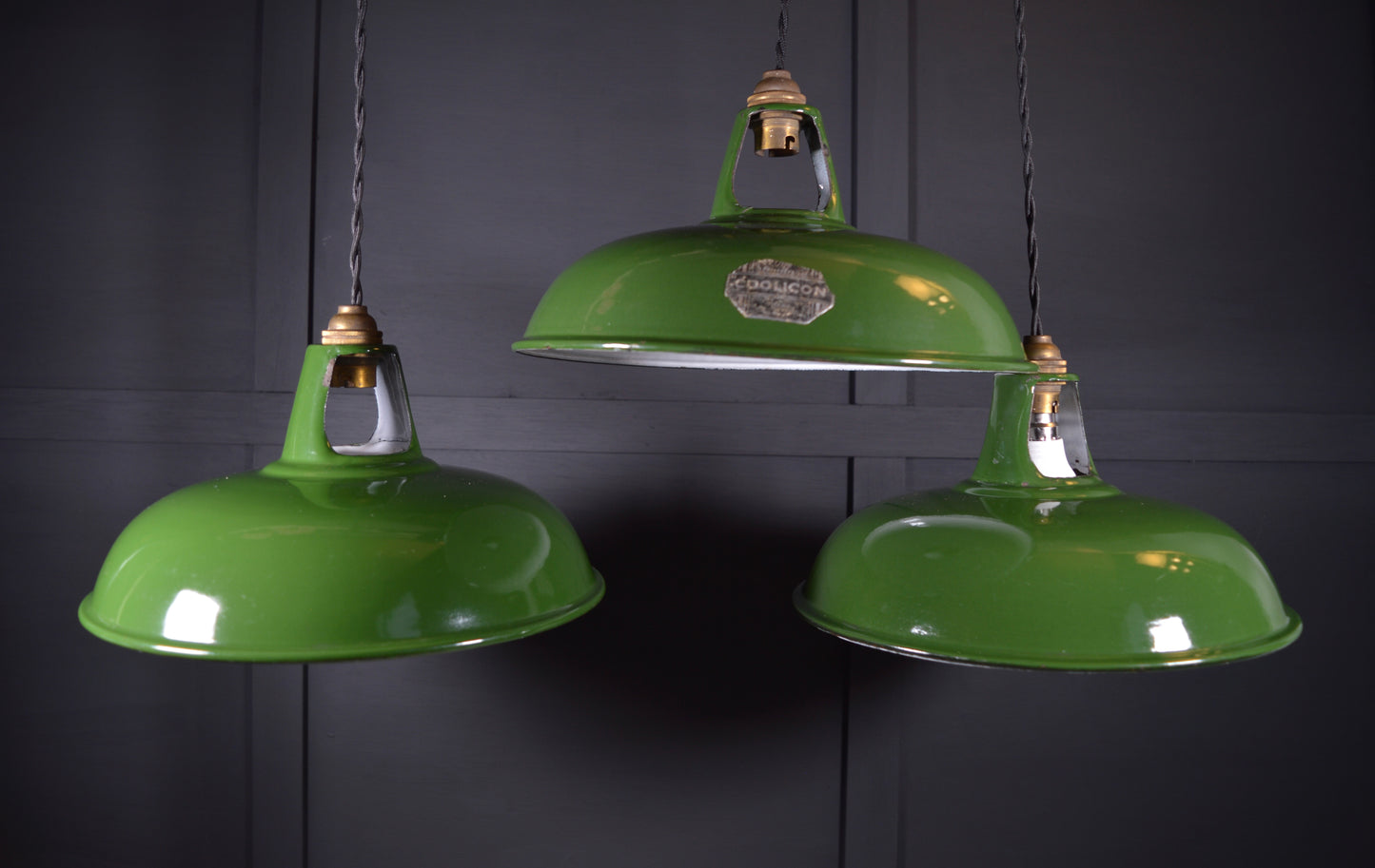 Vintage industrial enamel pendant lights by Coolicon (circa, 1940s)