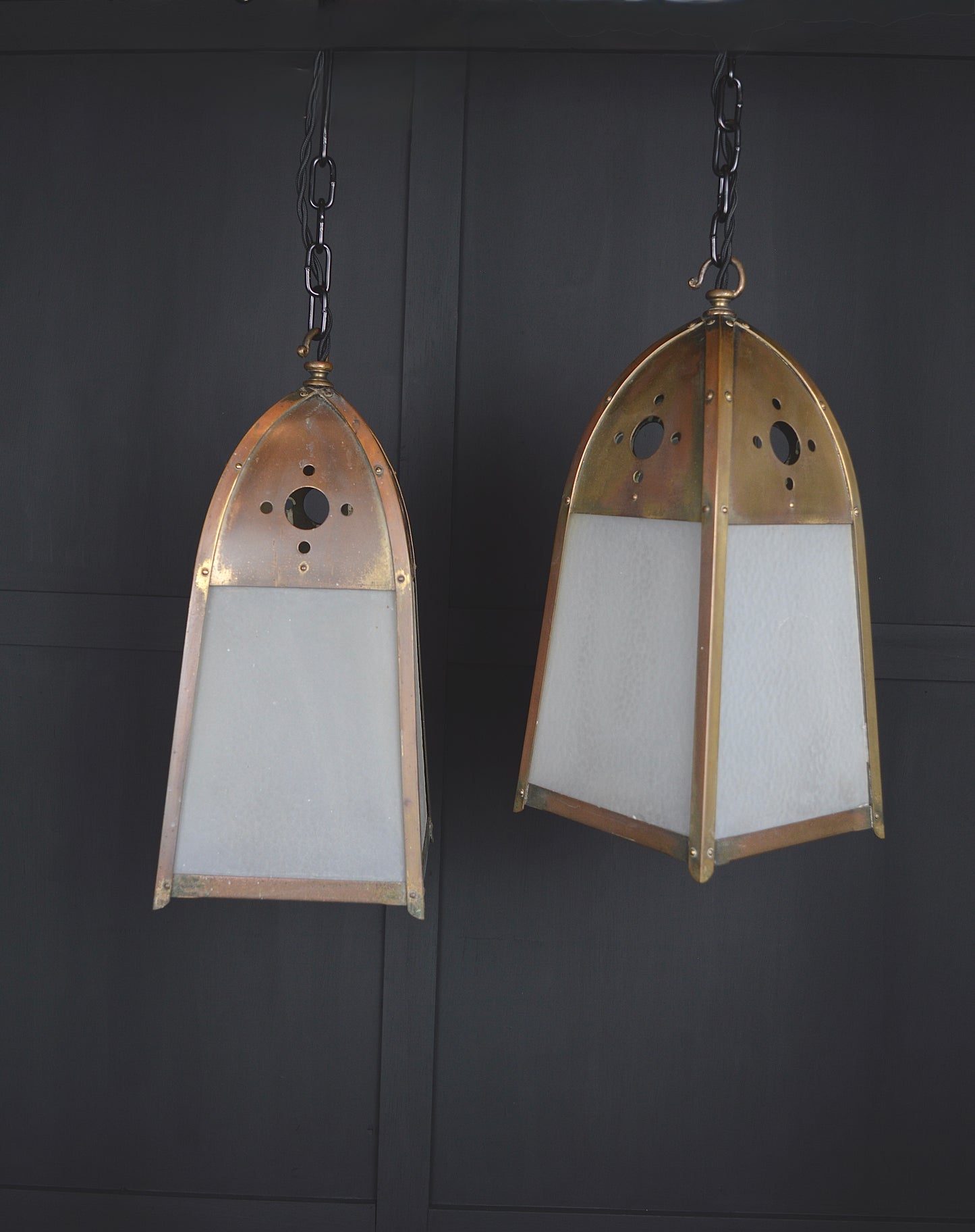 Pair of gothic revival glazed brass lights