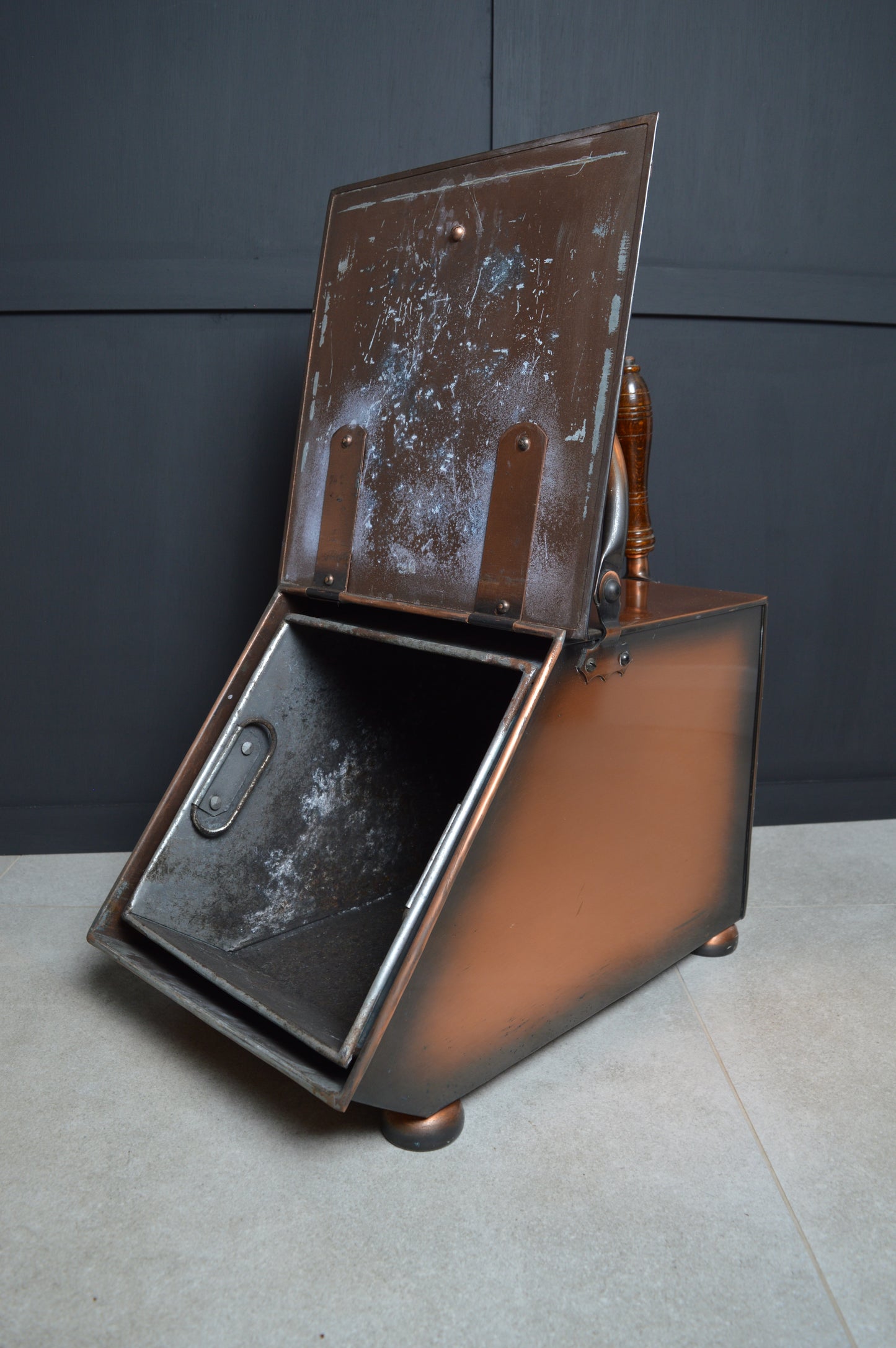Antique copper coal scuttle with wooden handle and hinged lid, vintage home decor