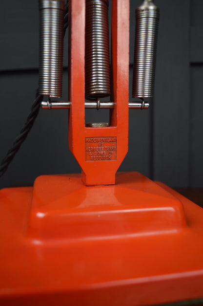 Red Anglepoise model 1227 lamp