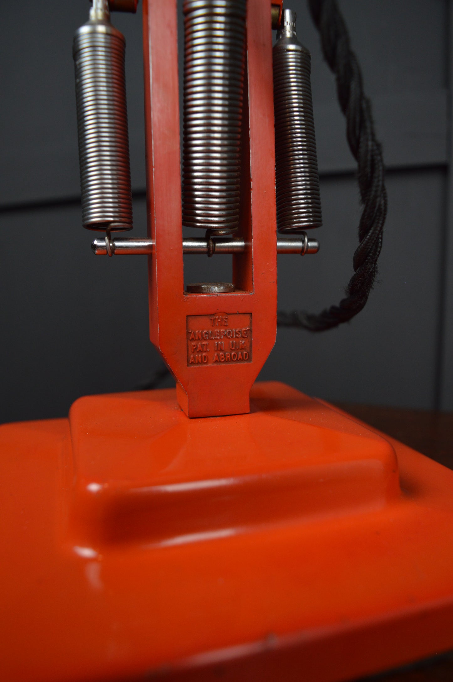 Red Anglepoise model 1227 lamp