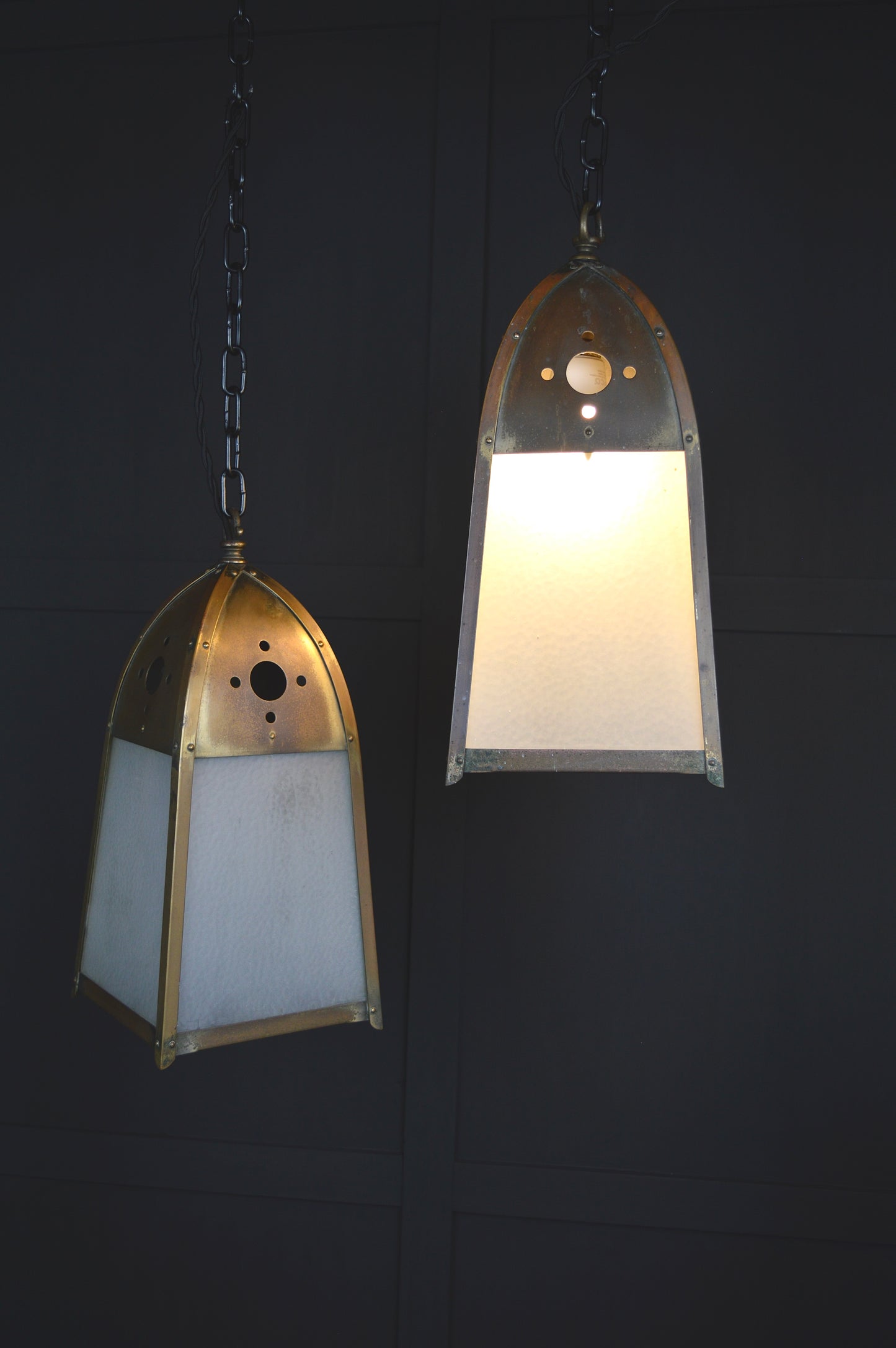 Pair of gothic revival glazed brass lights