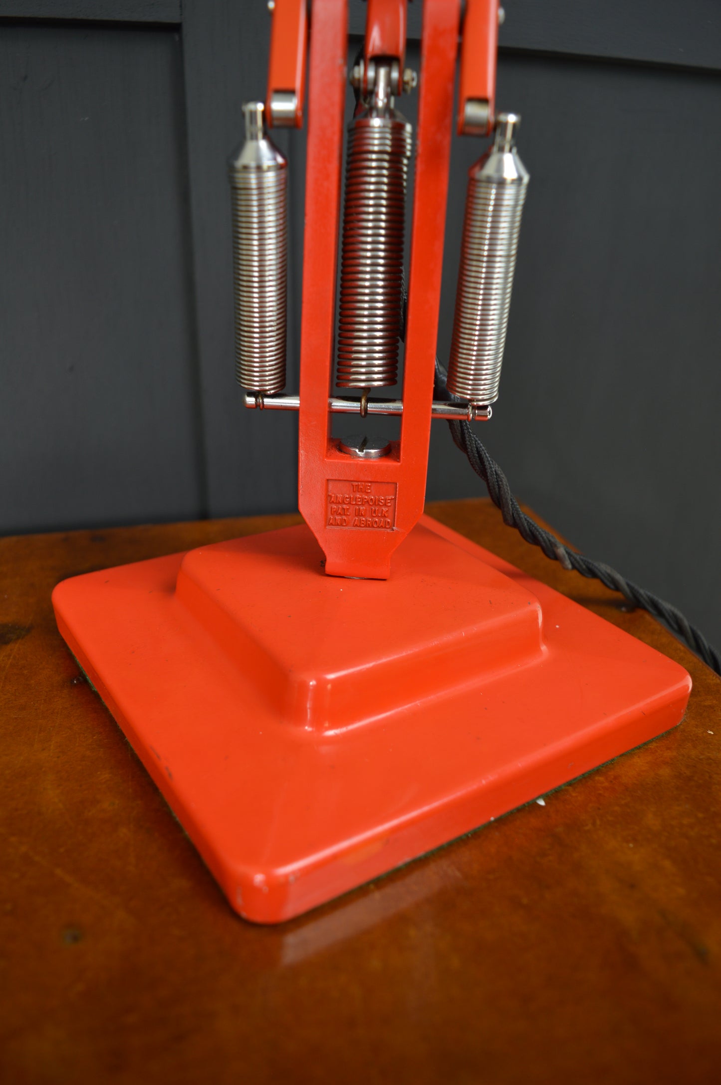 Red Anglepoise model 1227 lamp by Herbert Terry