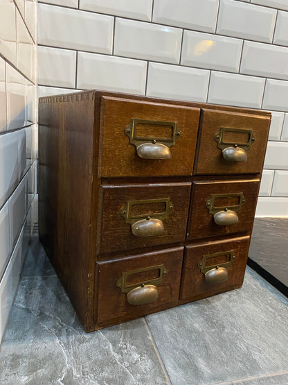 Early 20th century rustic oak 6 drawer index cabinet.