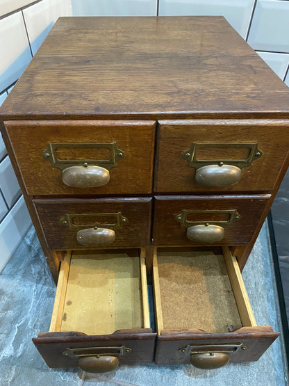 Early 20th century rustic oak 6 drawer index cabinet.