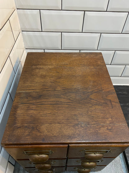 Early 20th century rustic oak 6 drawer index cabinet.