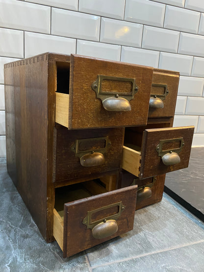 Early 20th century rustic oak 6 drawer index cabinet.