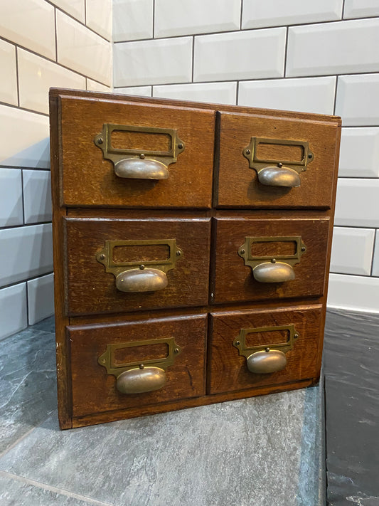 Early 20th century rustic oak 6 drawer index cabinet.