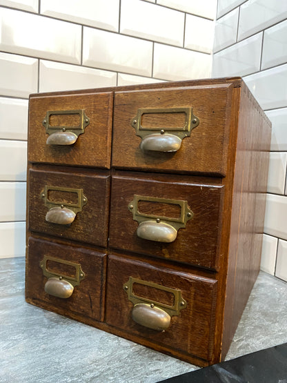 Early 20th century rustic oak 6 drawer index cabinet.